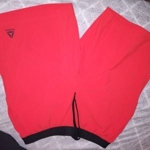 Red ish pink Reebok shorts